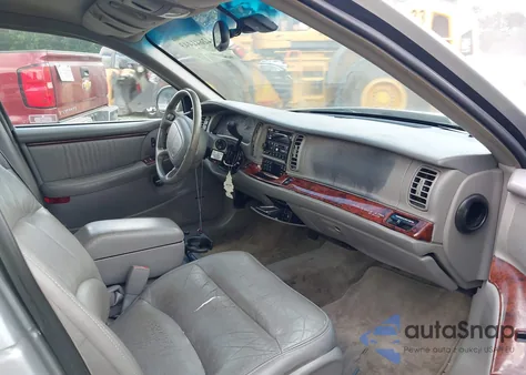 1999 Buick Park Avenue Ultra from USA, damaged, VIN 1G4CU5212X4615667